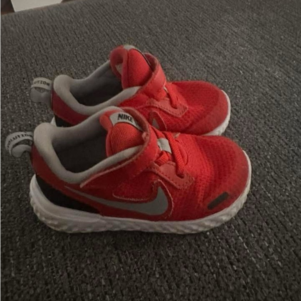 Nike Red and White Sneakers with Lace-Up Closure